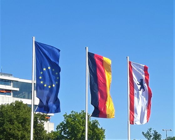 Europe Community, Germany and Berlin National Flags are Promoting Business